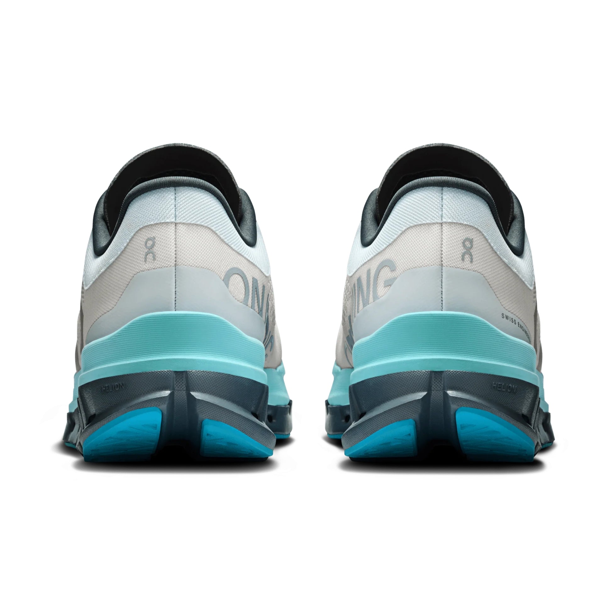 Back view of gray and blue running shoes on a white background