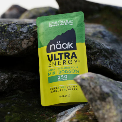 näak Ultra Energy drink mix packet on a rock