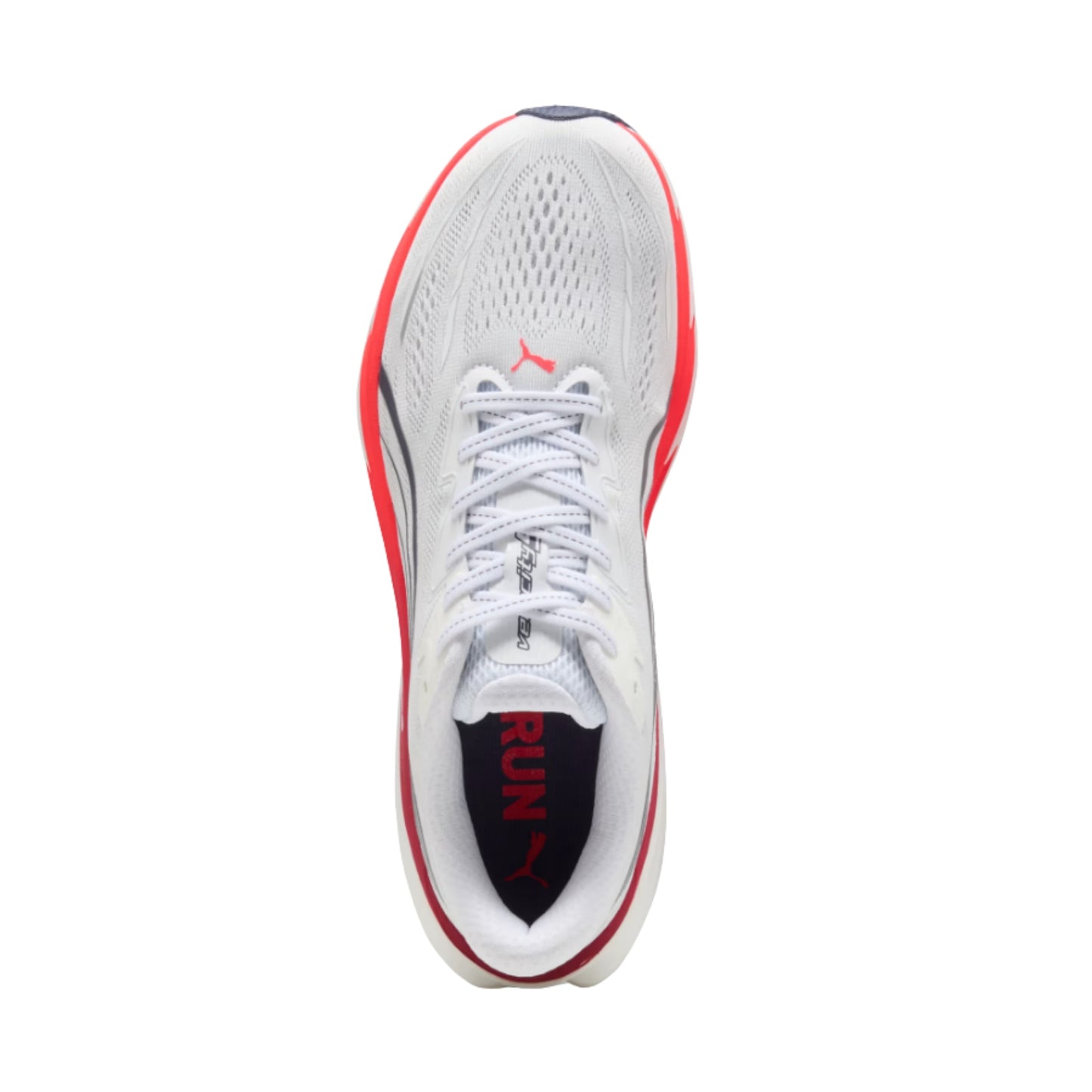 A Puma running shoe shown from a top-down view, featuring a white mesh upper with red and dark gray accents, white laces, and a black heel insert with red 'RUN' text.