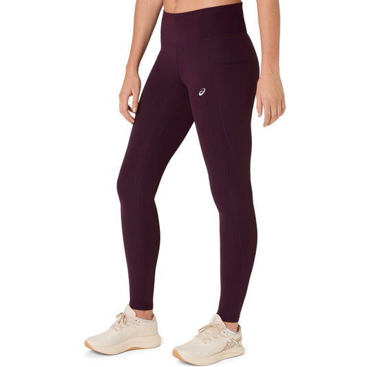 Maroon leggings with a brand logo worn by a person on a white background