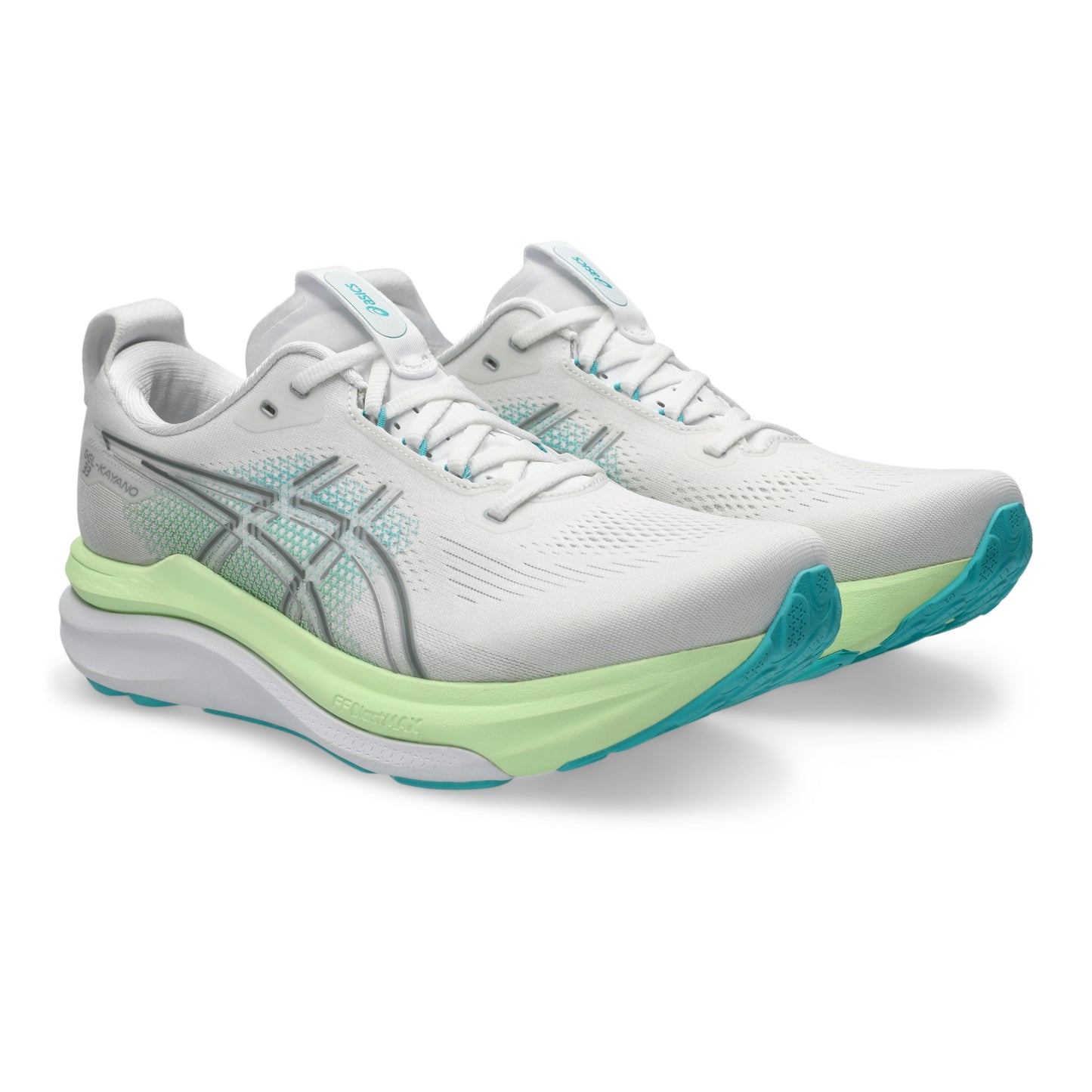 White Asics running shoe with green sole on a white background