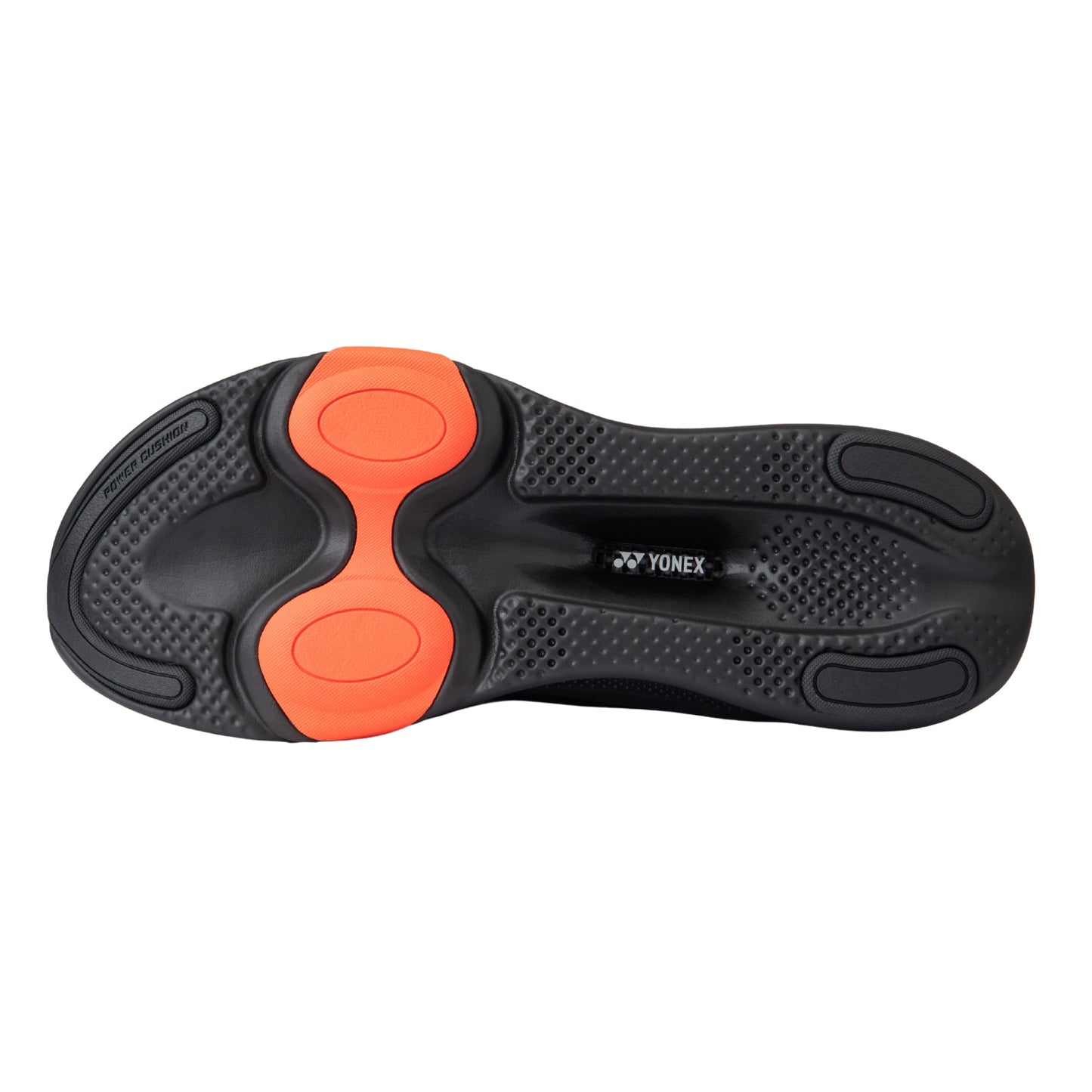 Black and red running shoe sole of a shoe with Yonex branding on a white background