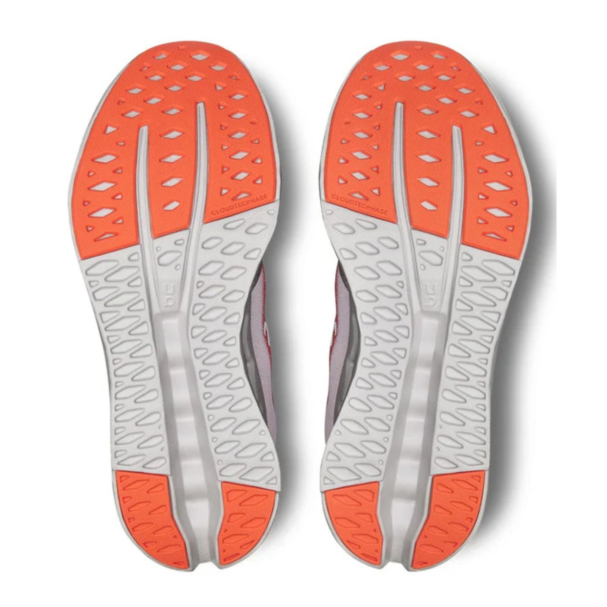 Close-up of orange and gray shoe insoles on a white background