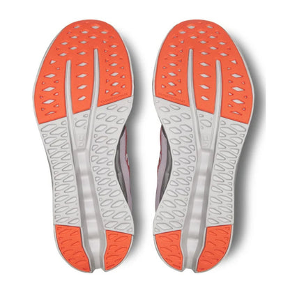 Close-up of orange and gray shoe insoles on a white background
