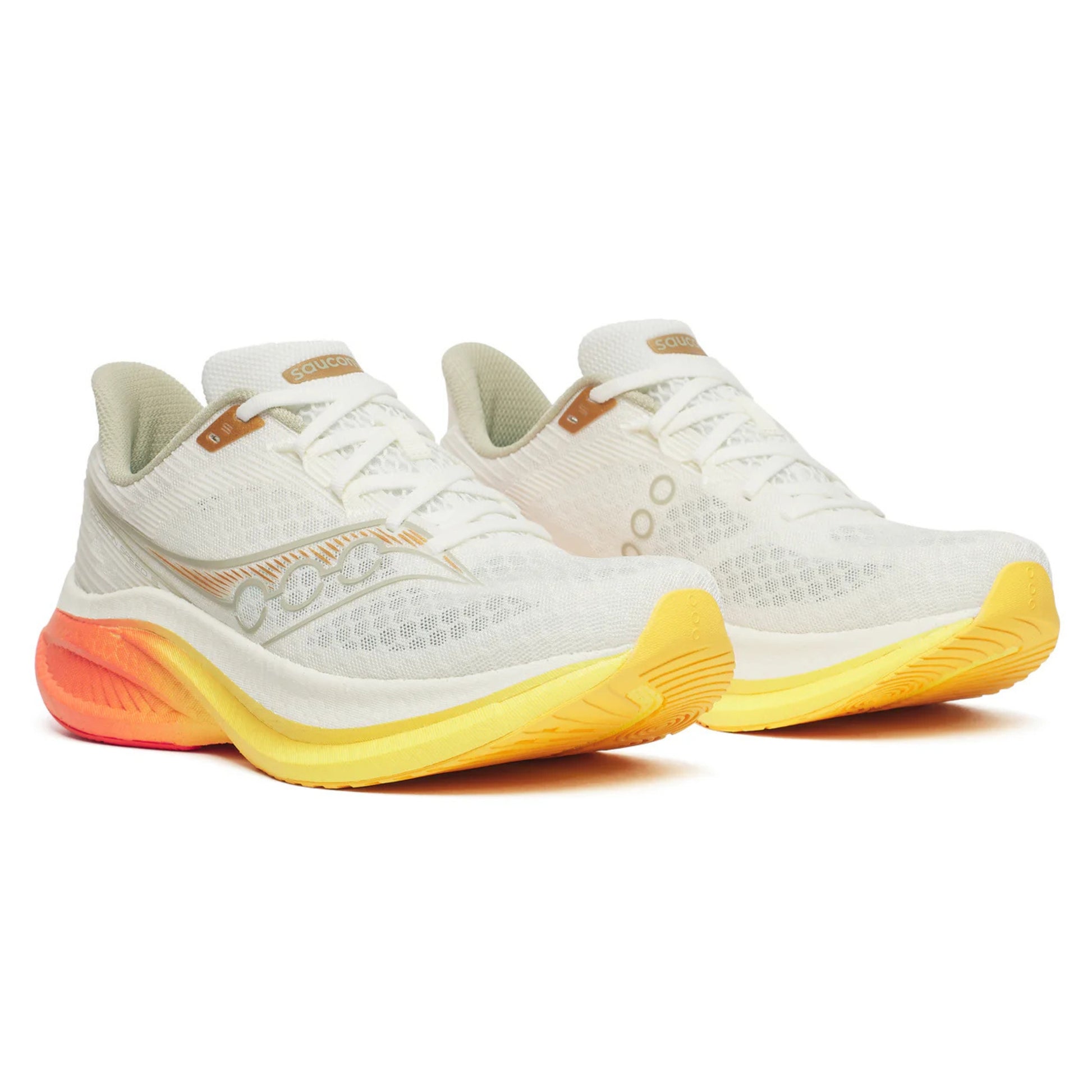 White Saucony running shoes with yellow soles on a white background
