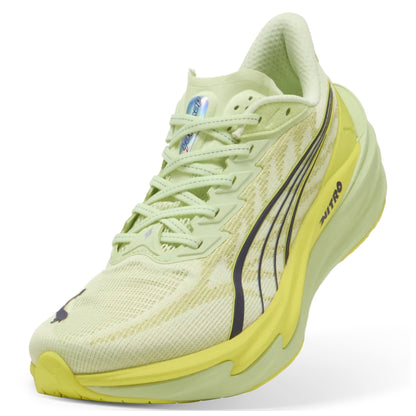 Yellow Puma running shoe with yellow sole on a white background