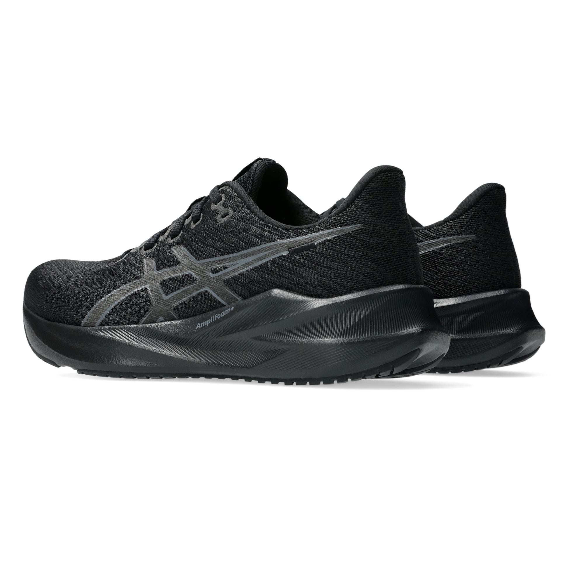 Black Asics running shoes with a prominent brand logo on a white background