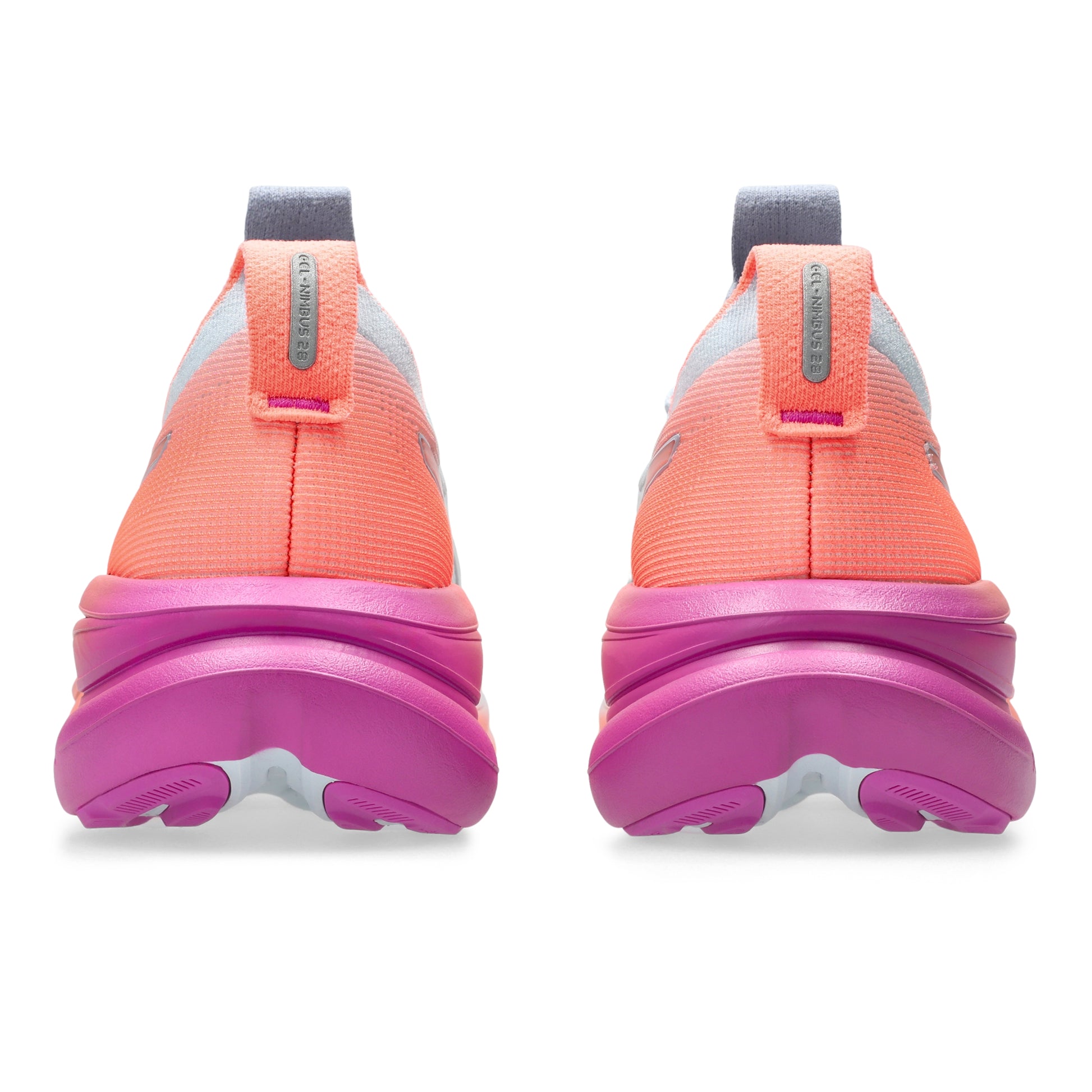 Back view of coral and pink soles on a white background