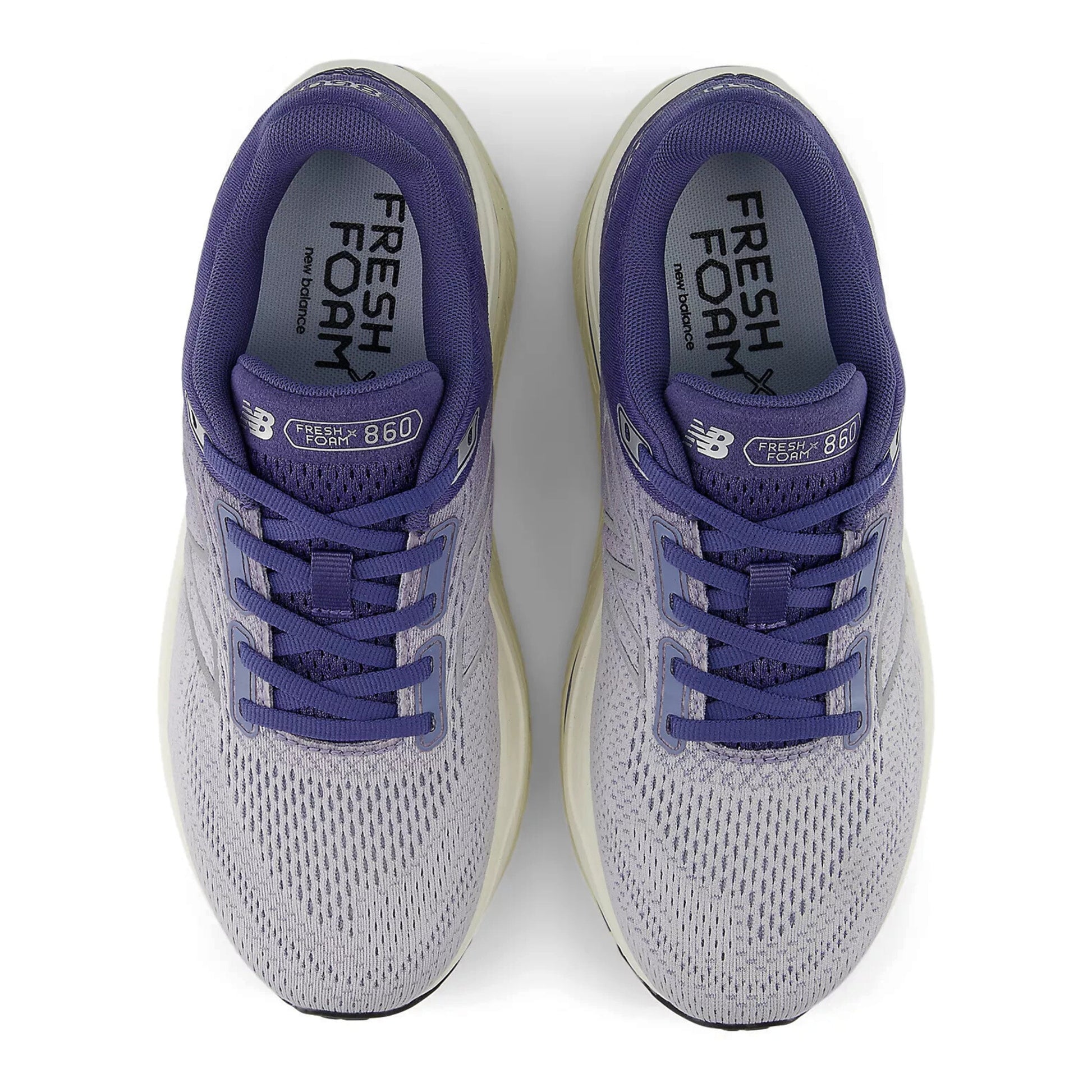Pair of gray and purple running shoes with 'Fresh Foam' branding on a white background