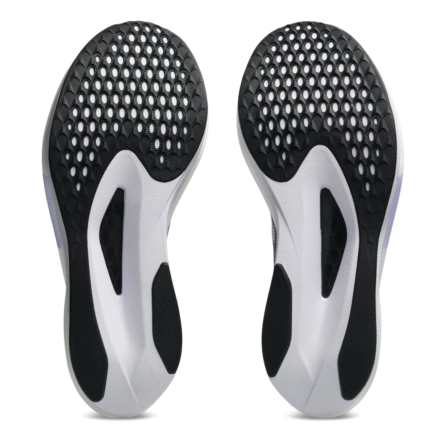 Pair of black and white shoe inserts on a white background