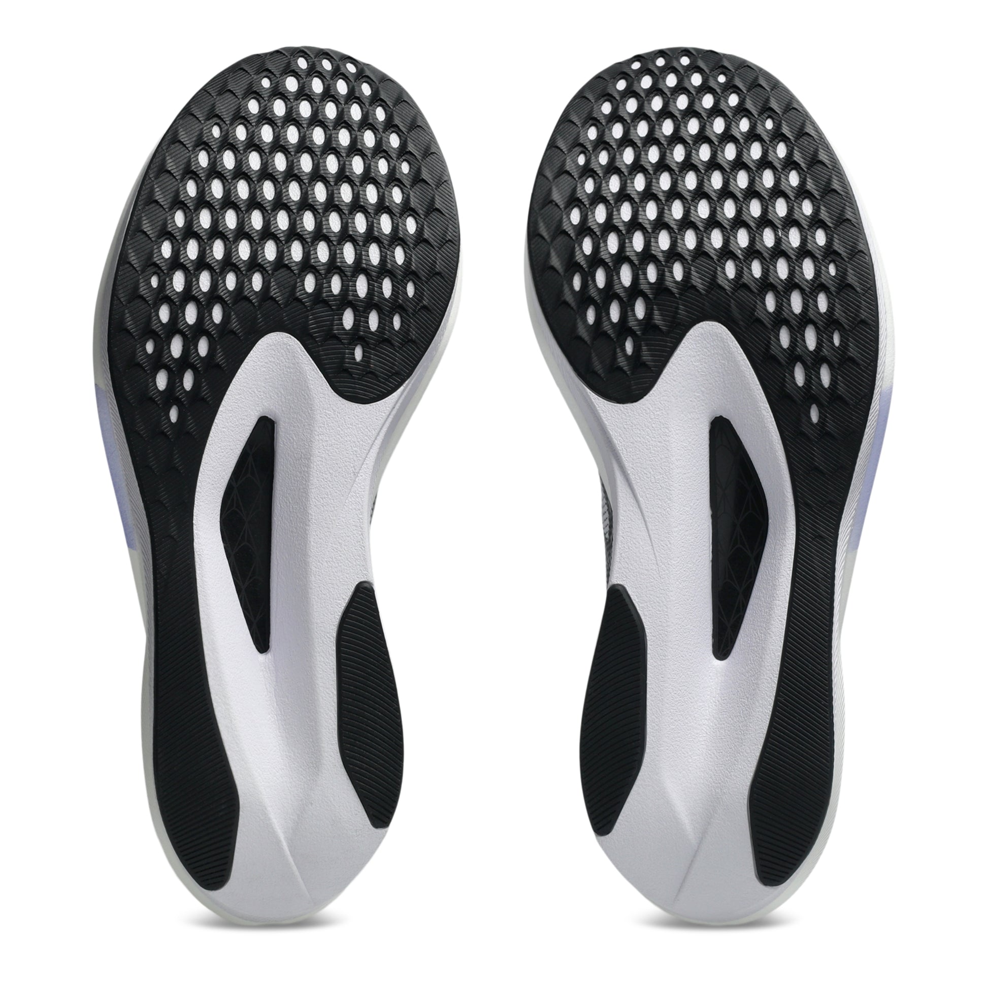 Pair of black and white shoe inserts on a white background