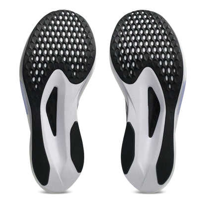 Pair of black and white shoe inserts on a white background