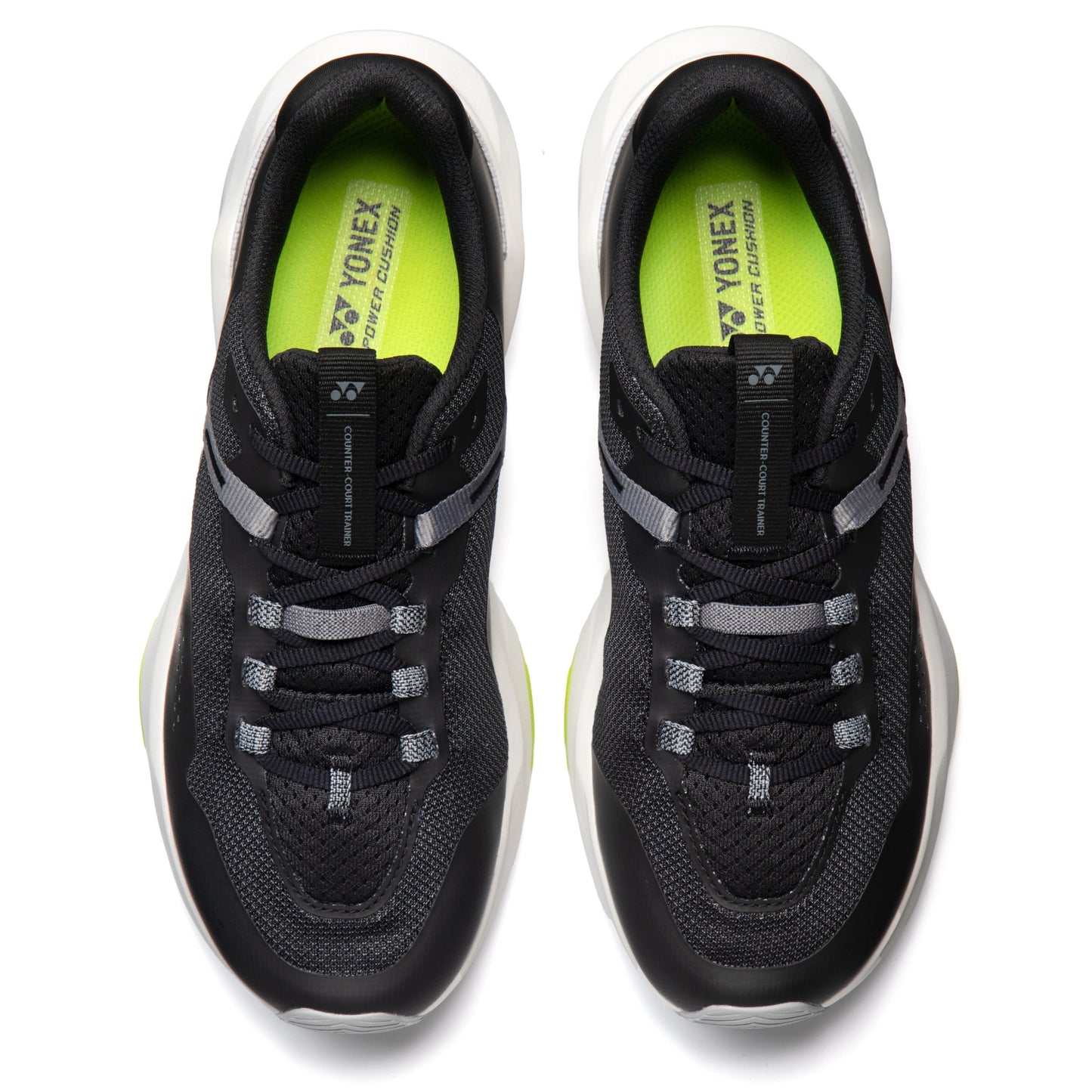 Black running shoes with Yonex branding on a white background