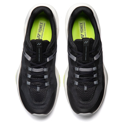 Black running shoes with Yonex branding on a white background