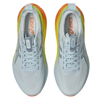 Pair of White and yellow Asics running shoe with orange accents on a white background