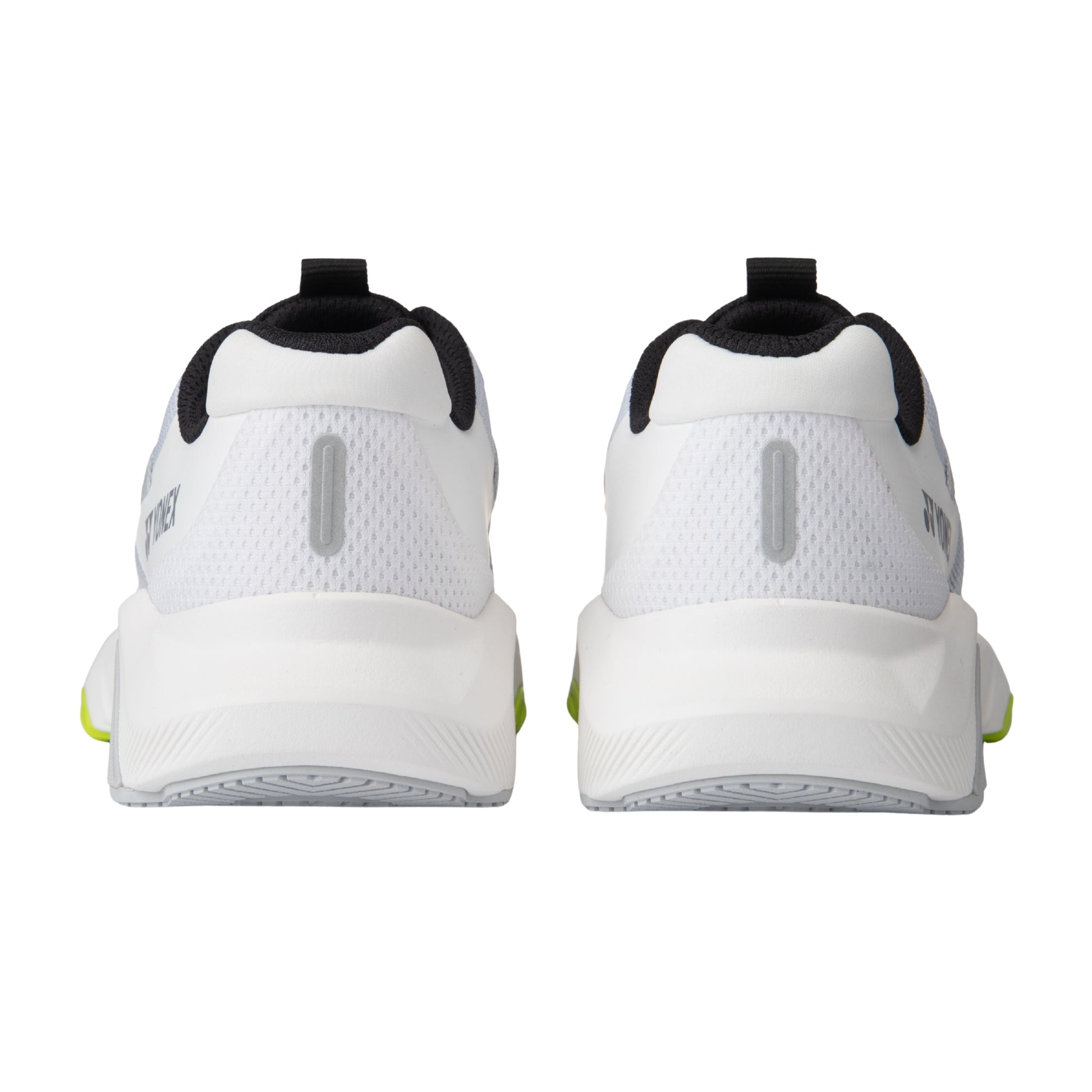White Yonex running shoes with black and green accents on a white background