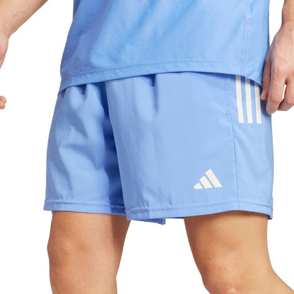 Light blue shorts with a white Adidas logo on a white background