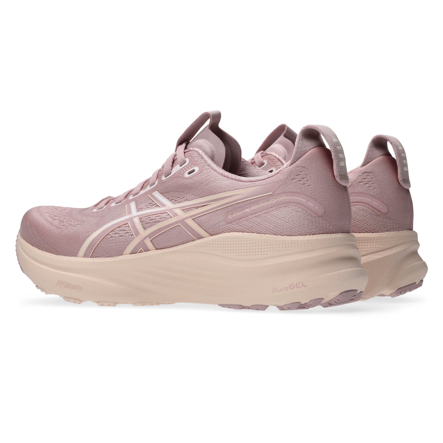 Pair of pink running shoes with a white sole on a white background