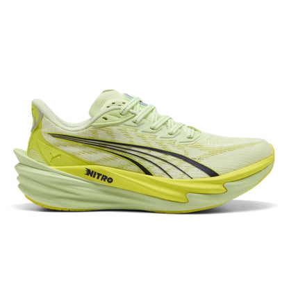 Light green Puma running shoe with yellow sole on a white background