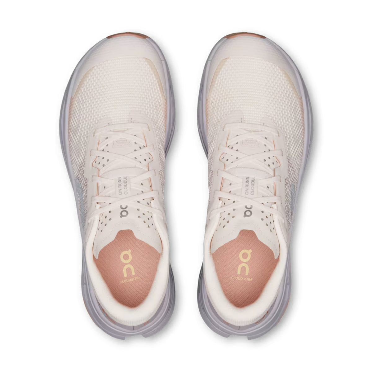 A pair of On running shoes shown from a top-down view, featuring a light beige mesh upper, white laces, and a peach-colored insole with the gold On logo.