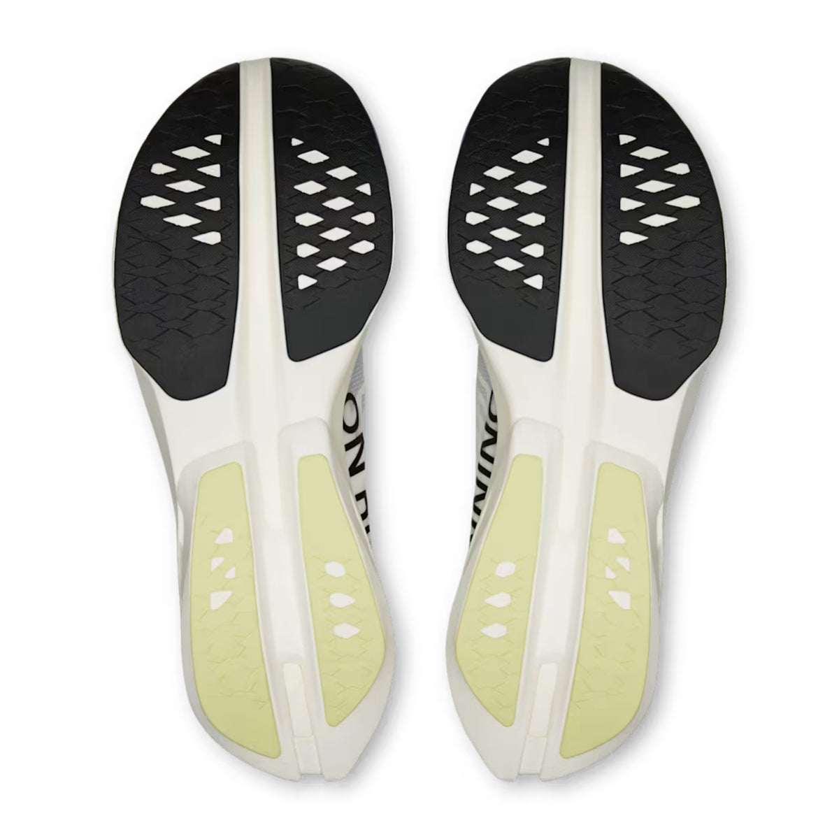 Top-down view of a pair of On running shoes soles, showing a white and black design with pale yellow-green heel pads and a textured black outsole.