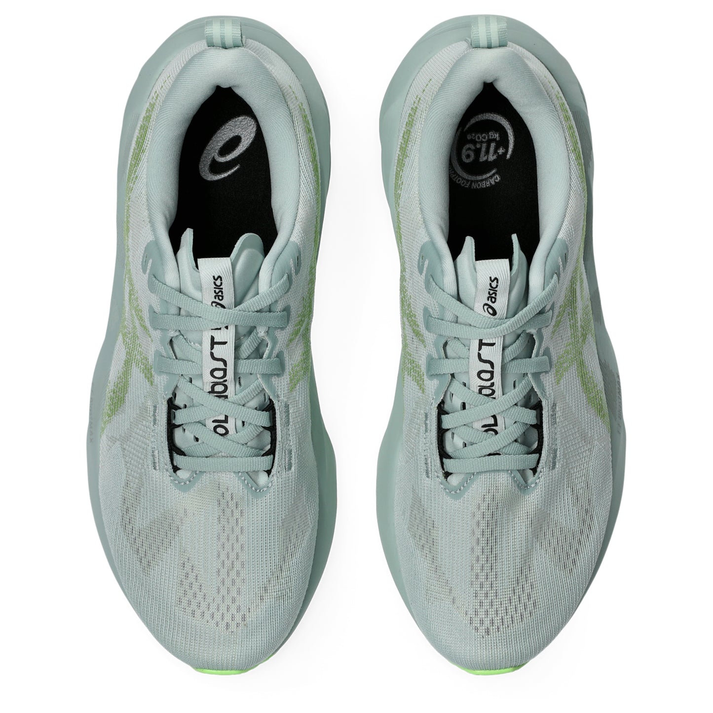 Light blue Asics running shoes with green sole on a white background