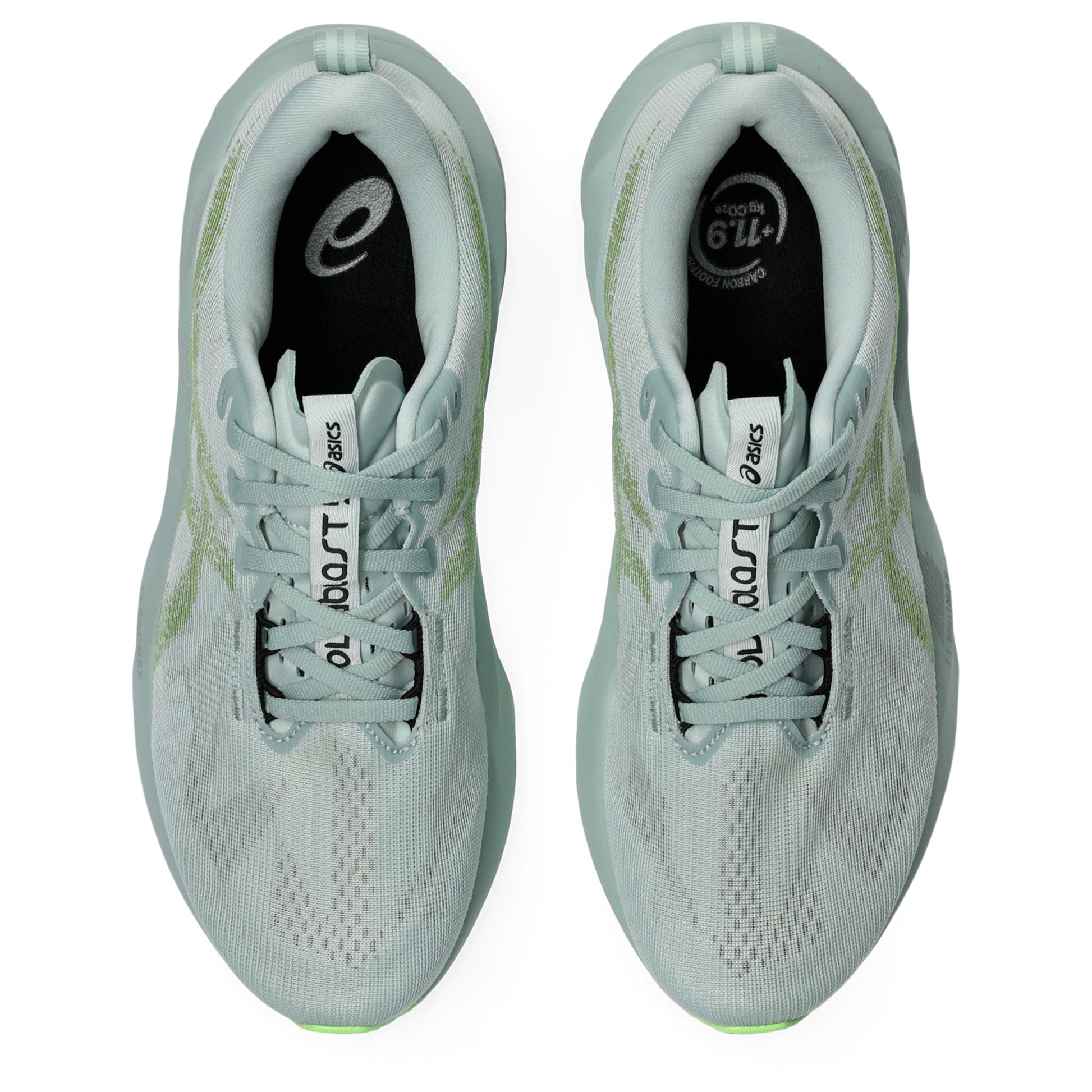 Light blue Asics running shoes with green sole on a white background