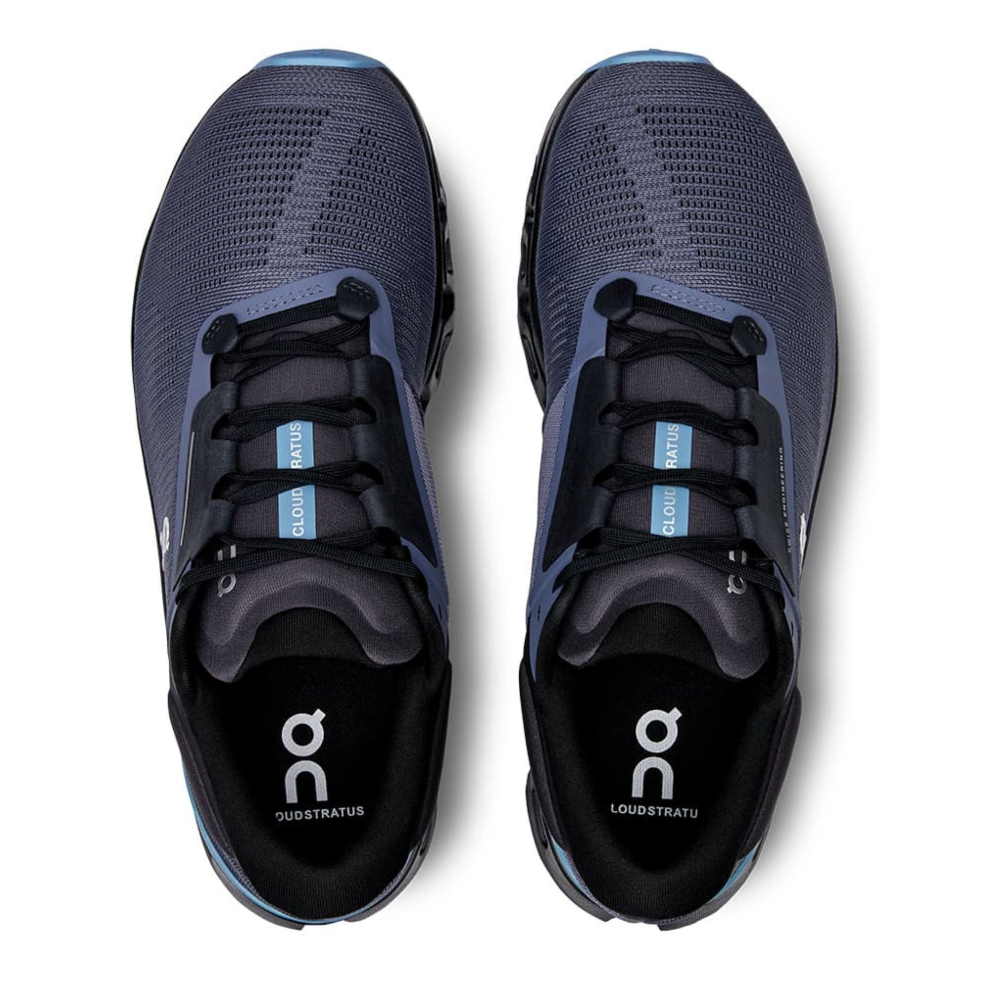 Pair of blue running shoes with black soles on a white background