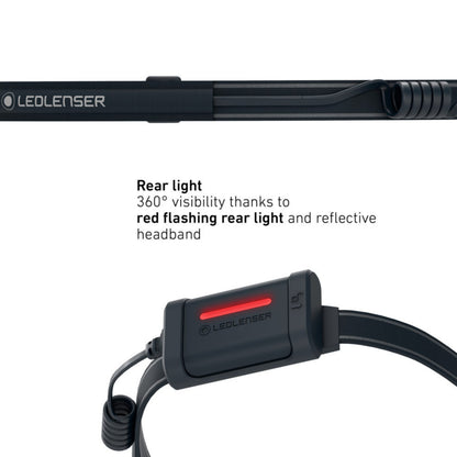 LED lenser headlamp with red flashing rear light and reflective headband on a white background