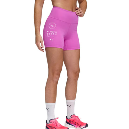 Person wearing pink Puma Hyrix tights with a logo on a white background