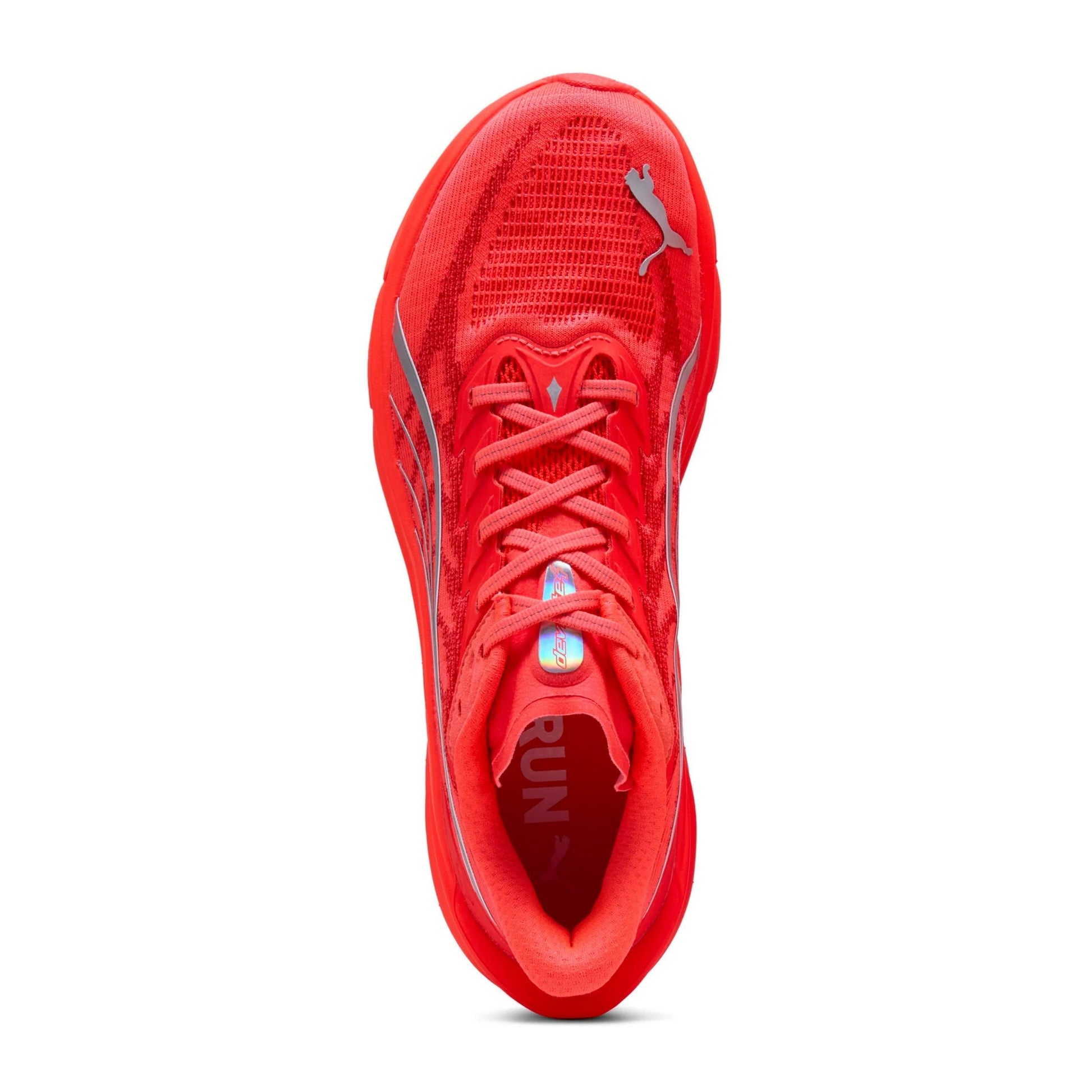 Red Puma running shoes with a visible brand logo on a white background