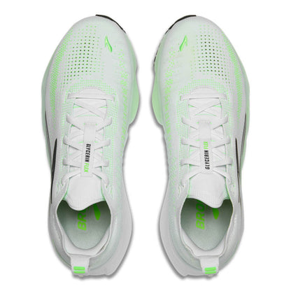 White Brooks running shoes with green accents on a white background