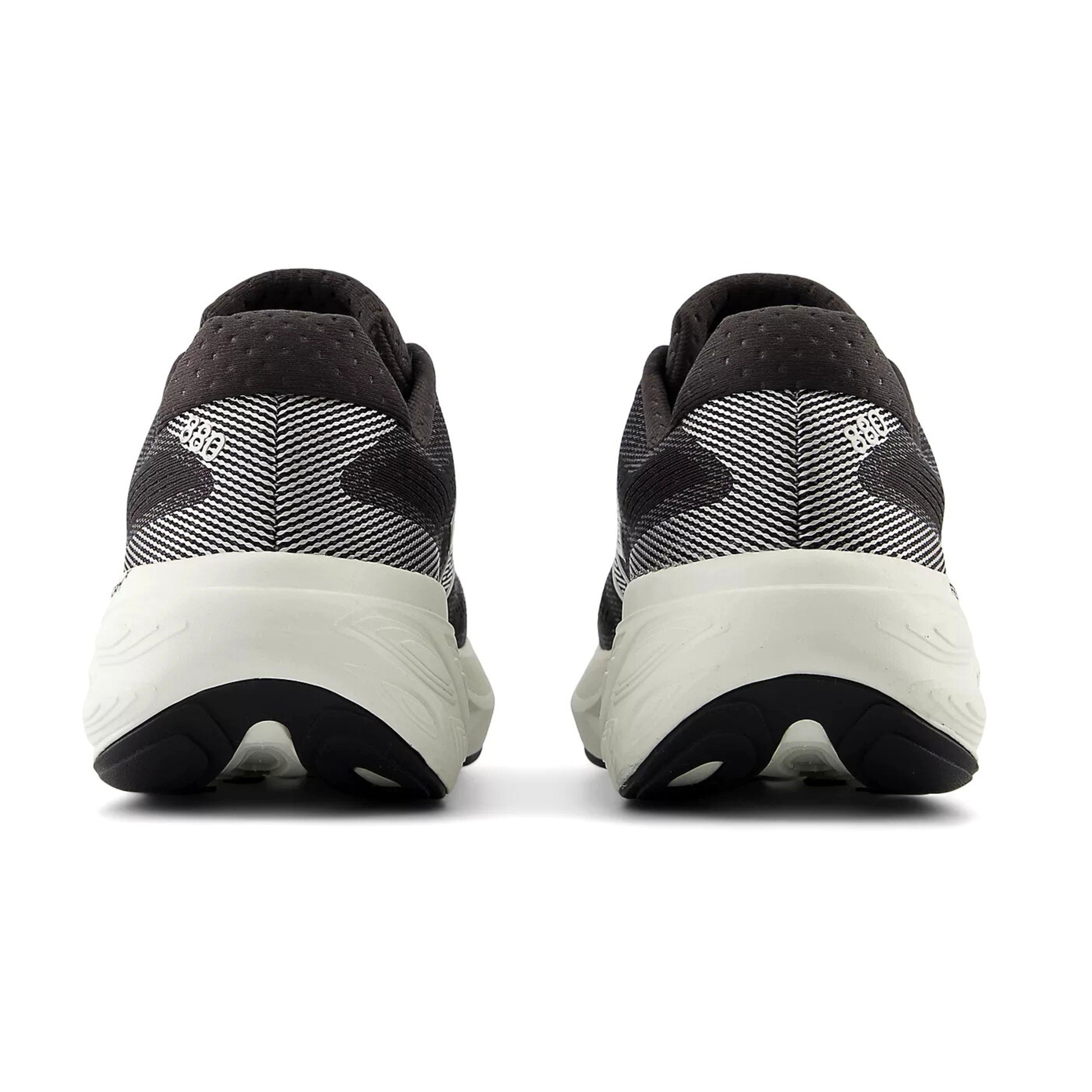 Black and white running shoes with brand logo on a white background