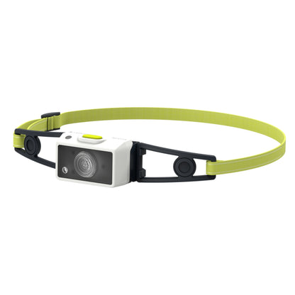 Headlamp with a green strap on a white background