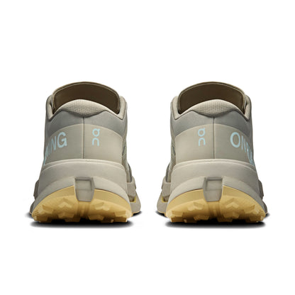 Back view of On running shoes with the logos on a white background