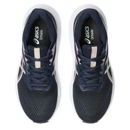 A pair of ASICS running shoes in navy blue with white and light pink accents, shown from a top-down view on a white background.