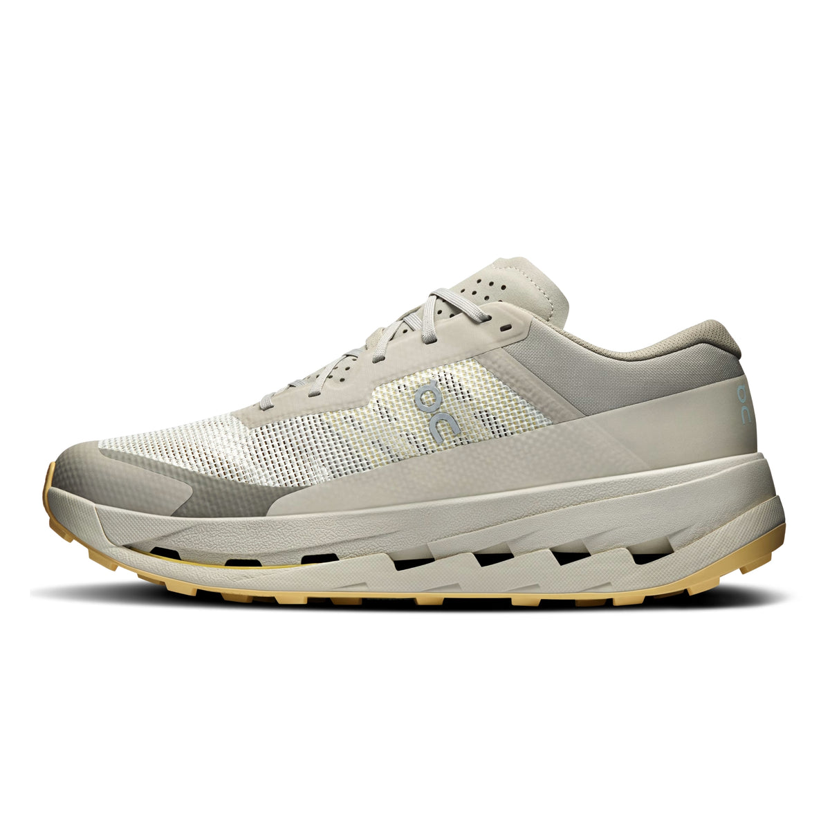 Grey On running shoe with blue wording and yellow sole on  a white background