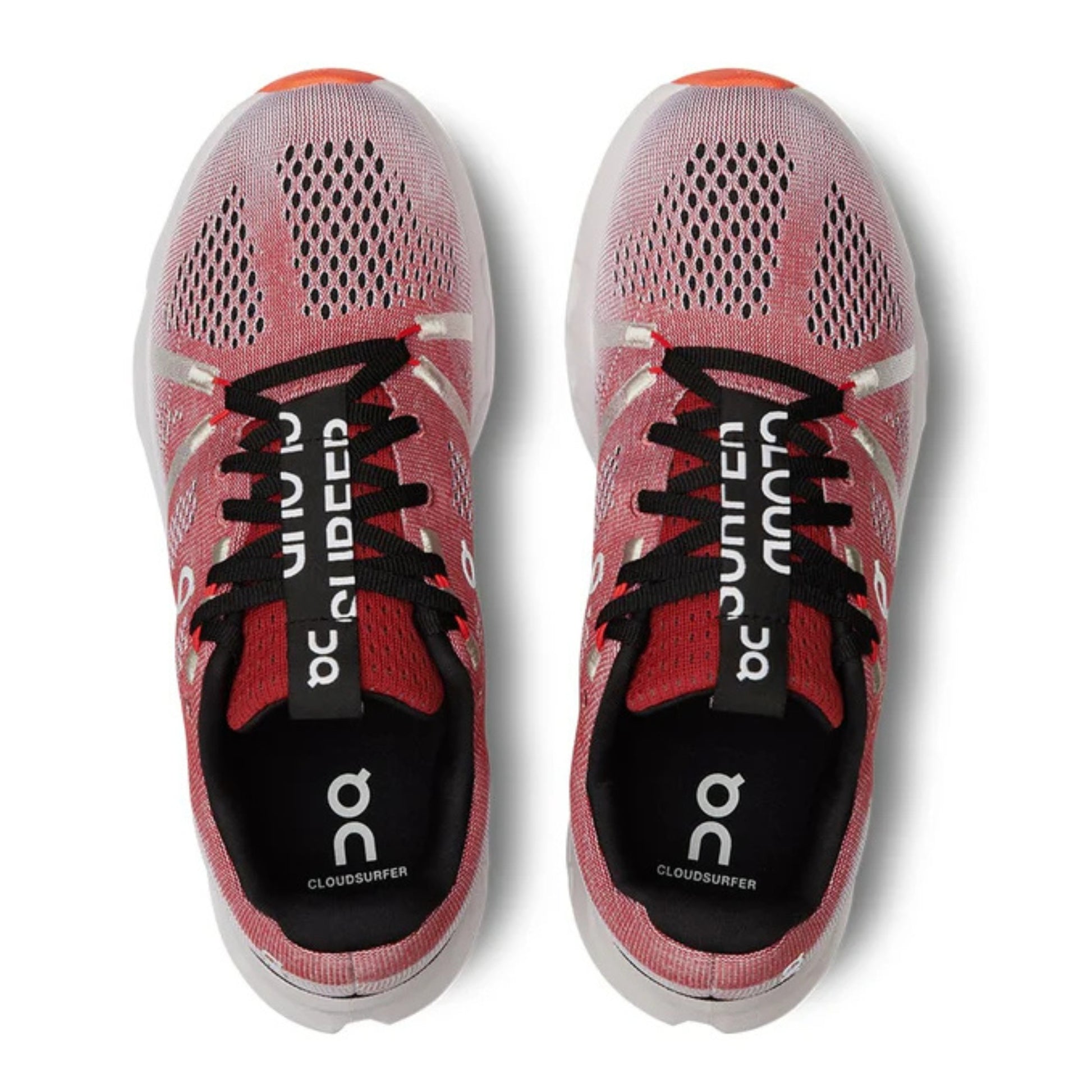 Pink running shoes with black laces and visible branding on a white background