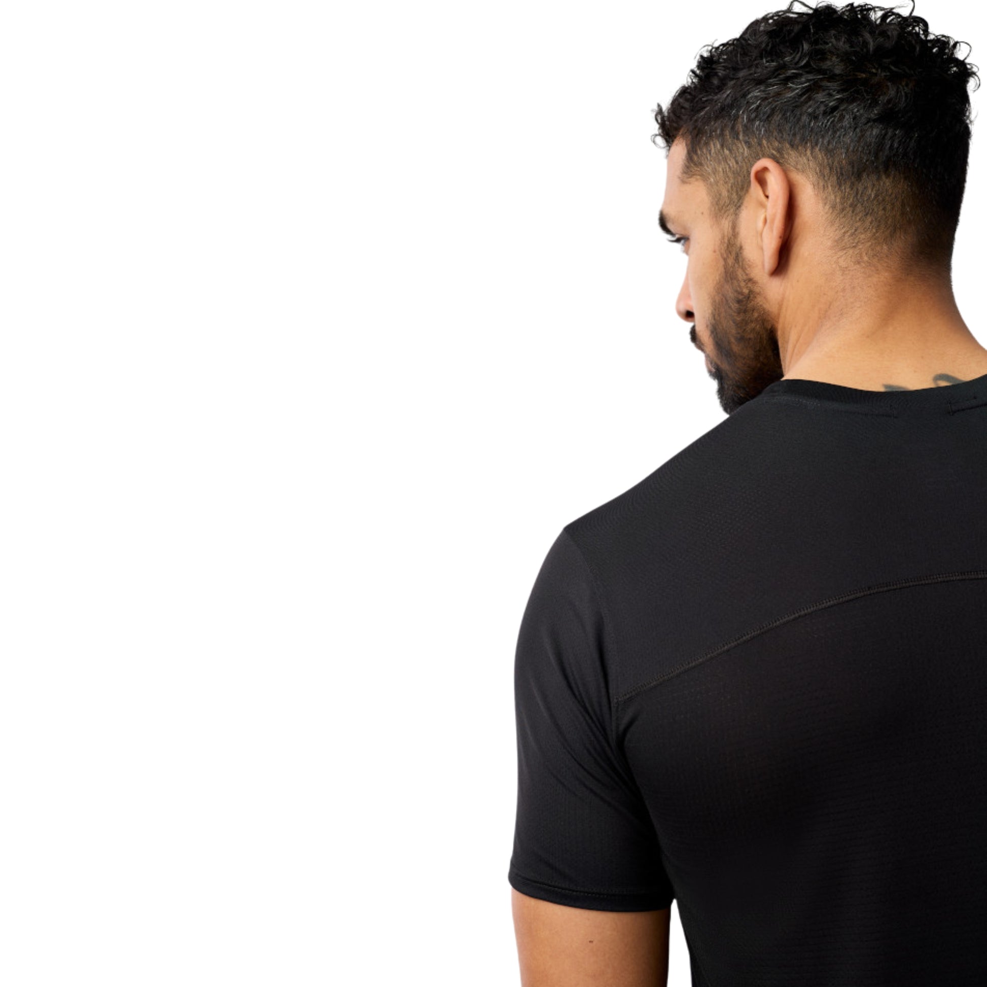 Man wearing a black t-shirt on a white background