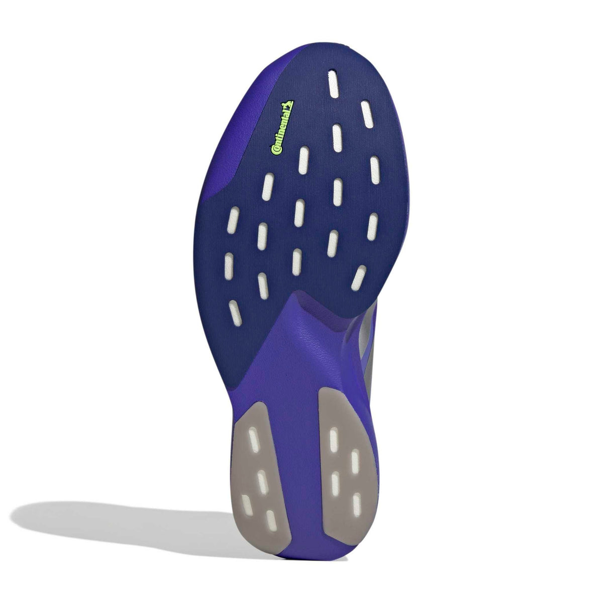 The outsole of a running shoe in purple and navy blue with gray heel pads and a small green 'Continental' logo, shown on a white background with a soft shadow.