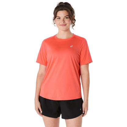 Person wearing coral shirt on a white background