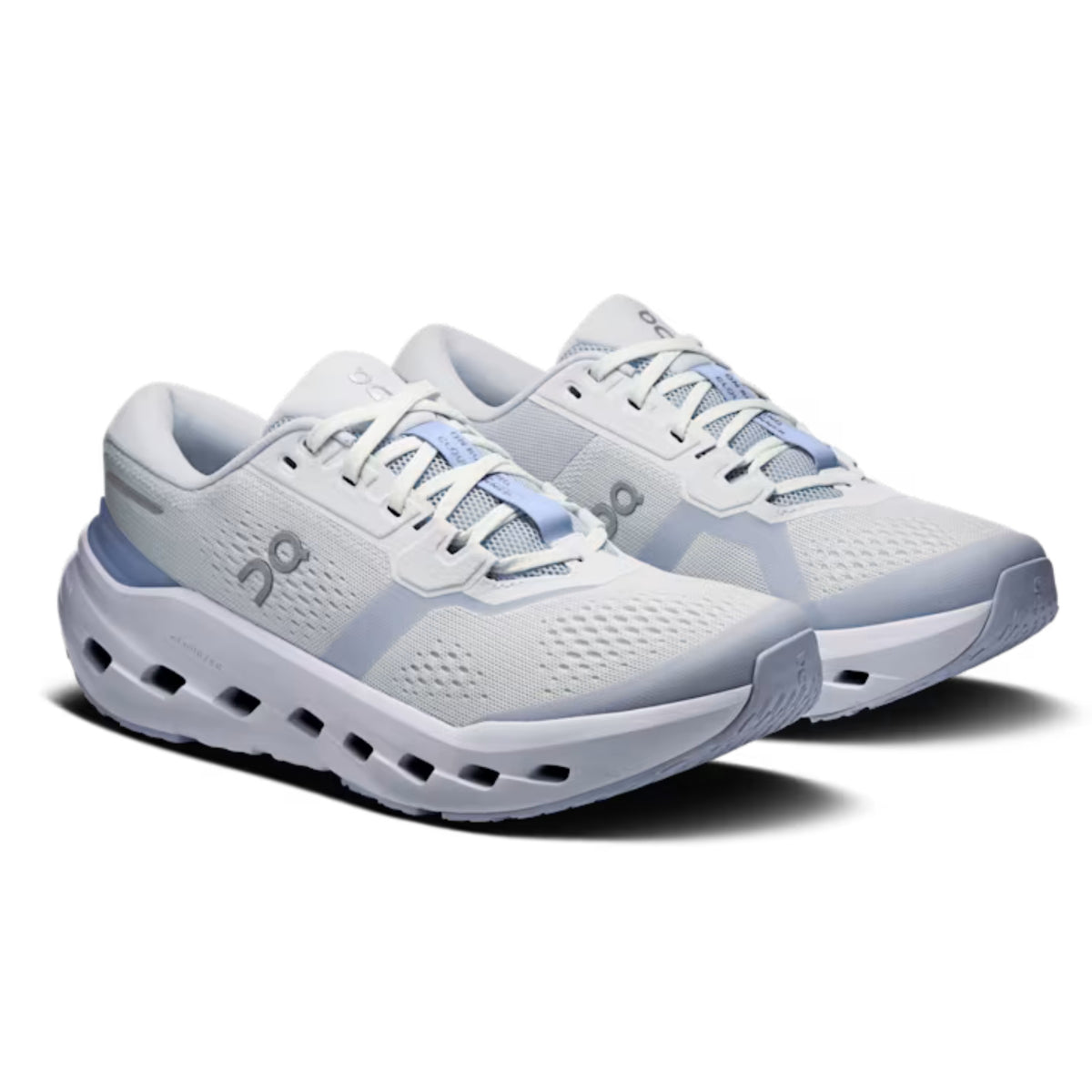 A pair of On running shoes in white and light blue, shown from a three-quarters angle on a white background with a soft shadow.