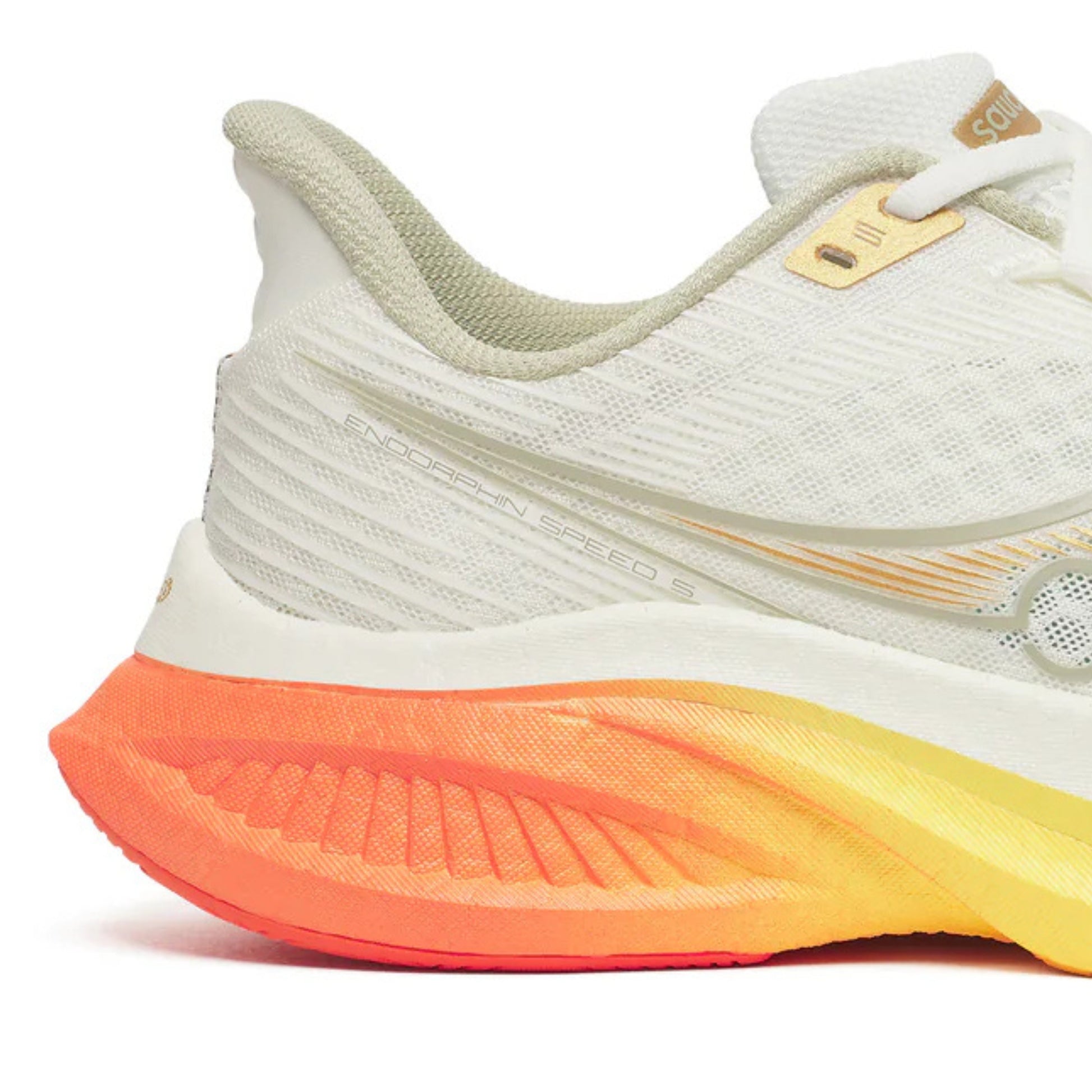 White Saucony running shoe with a colorful sole on a white background