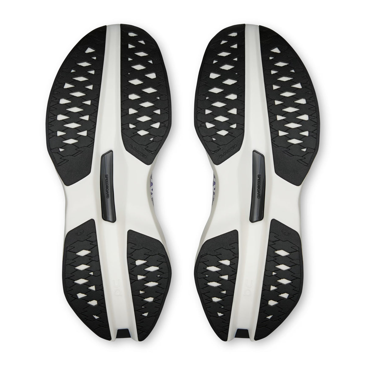 A pair of On running shoes shown from the sole view, featuring a black and white design with a textured, perforated pattern on the outsole.