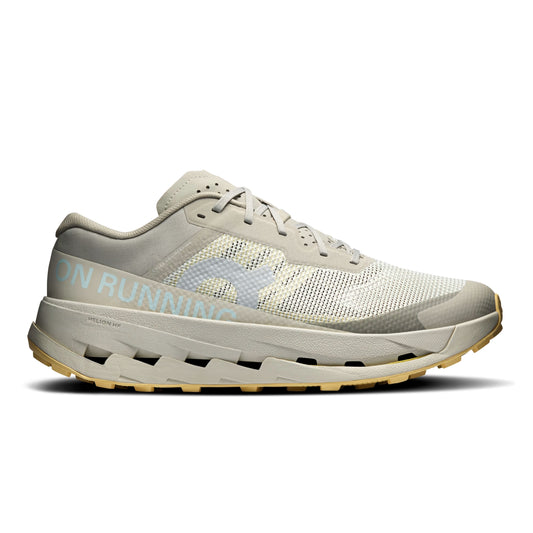 Grey On running shoe with blue wording and yellow sole on  a white background