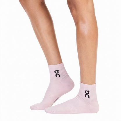 Pink On crew sock on a white background