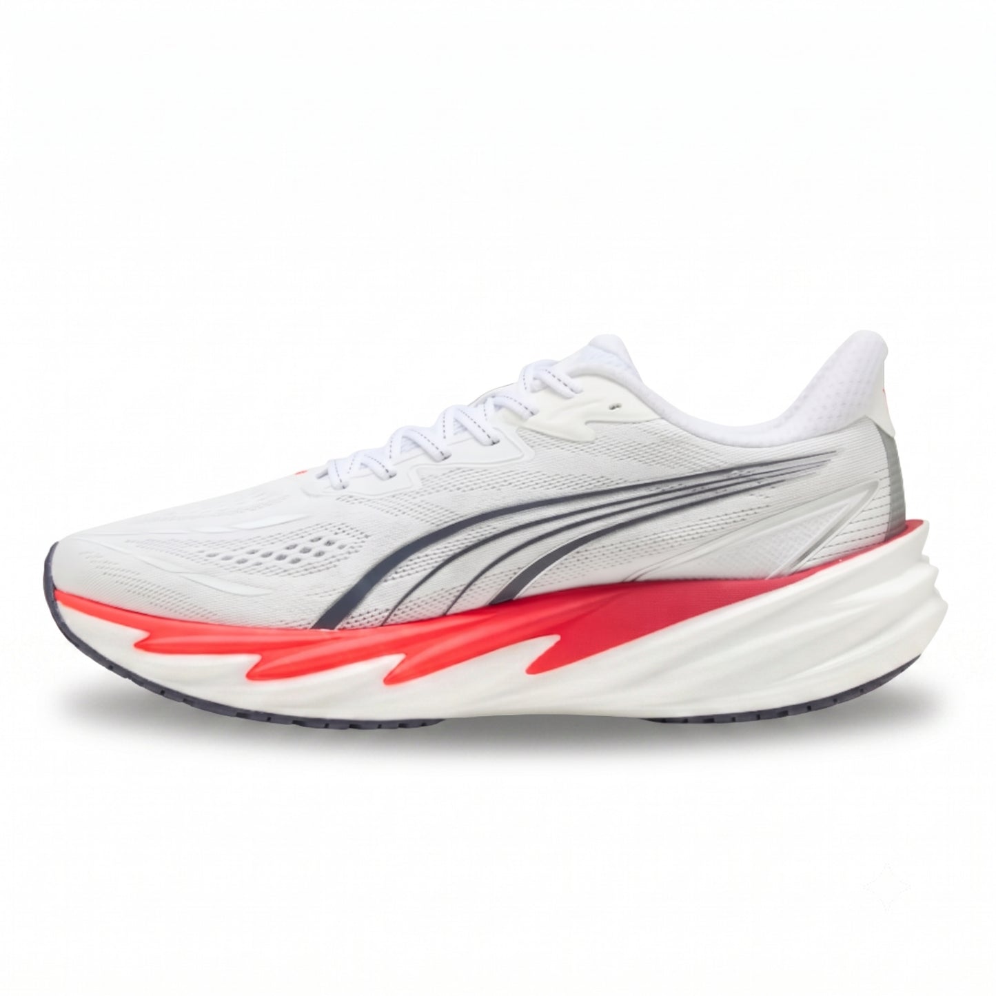 A Puma running shoe in white with a black and red midsole accent, shown in a side profile on a white background.