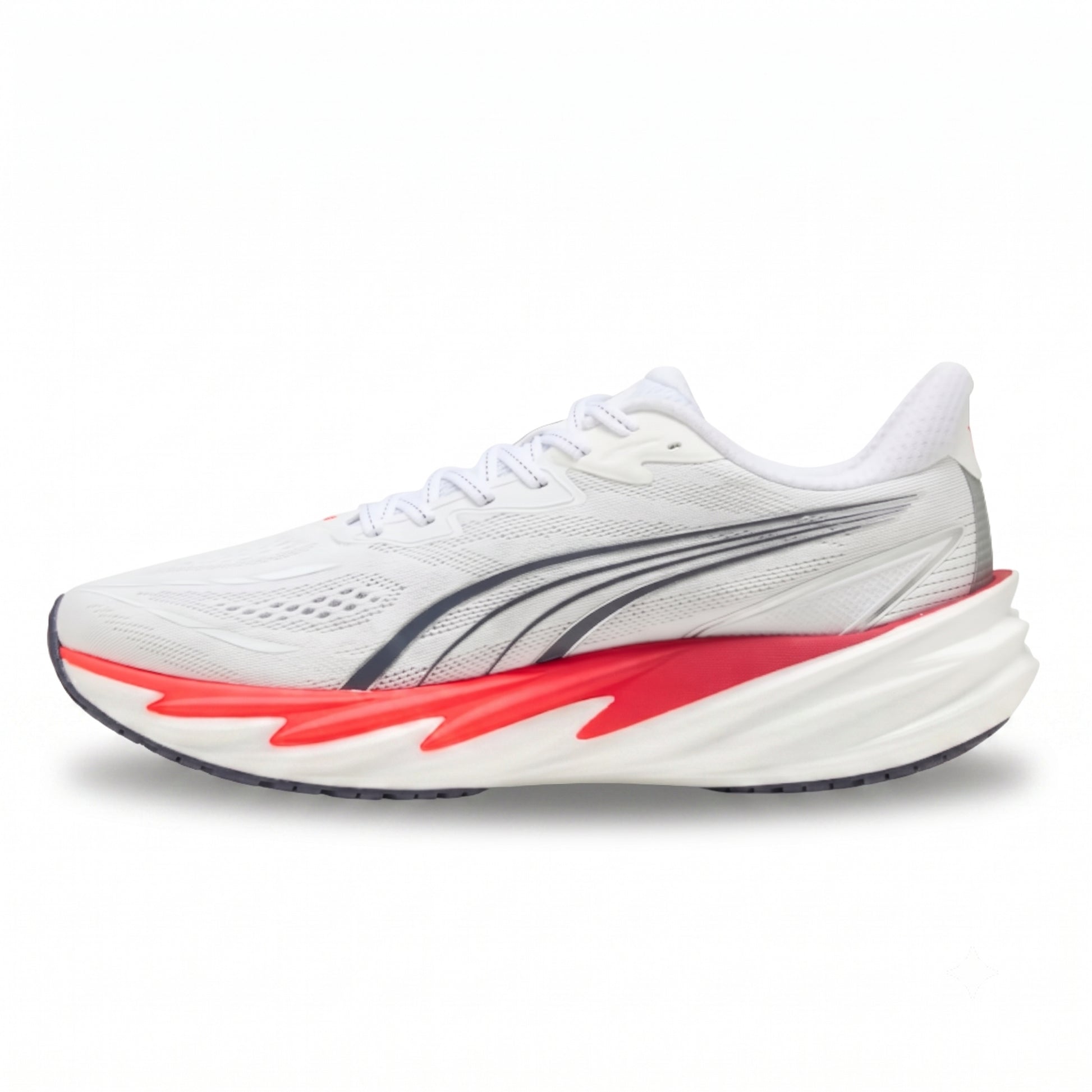 A Puma running shoe in white with a black and red midsole accent, shown in a side profile on a white background.