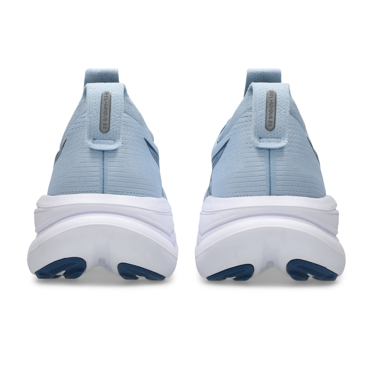 A pair of light blue Asics running shoes shown from the back, featuring a textured knit upper, a thick white midsole, and a dark blue outsole.