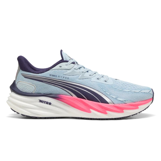 Light blue Puma running shoe with pink sole on a white background